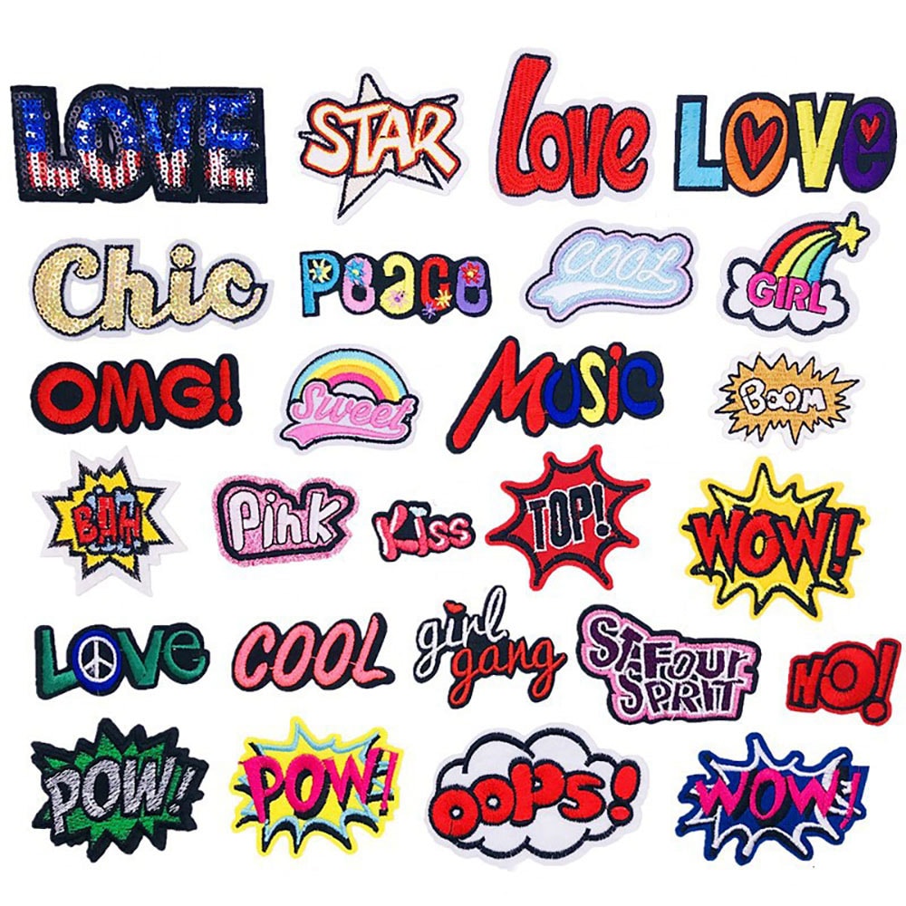 Kirvotut kangasmerkit sekalaisilla motiiveilla - 26-pakkaus