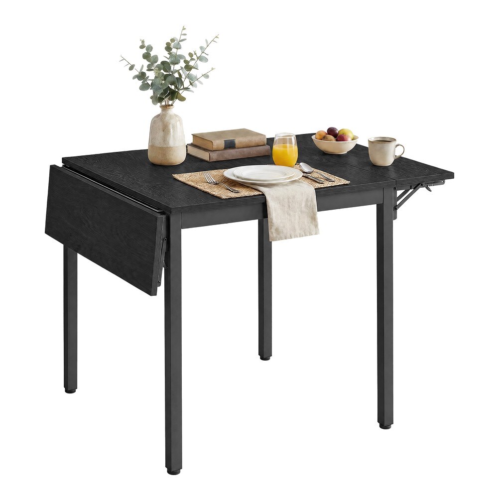 Musta jatkettava ruokapöytä 2 taitettavalla sivulevyllä, 84,5–120 x 78 x 76,2 cm, teräsjalat
