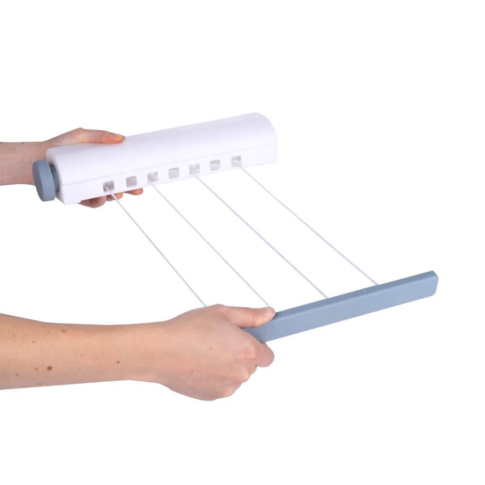 Ulosvedettävä pesulinja / kuivauslinja, jossa on 4 linjaa - tilaa säästävä kuivausratkaisu