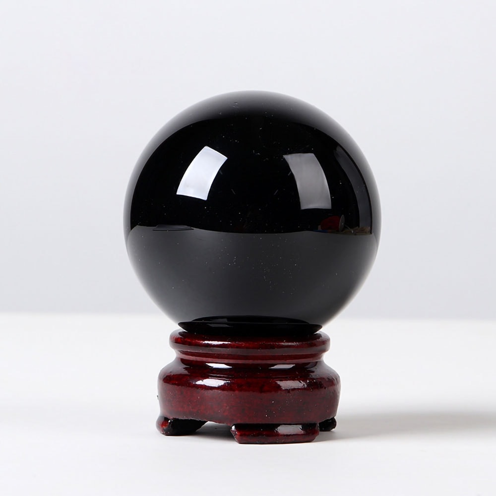 Kristallipallo mustalla obsidiaani puujalustalla 5cm