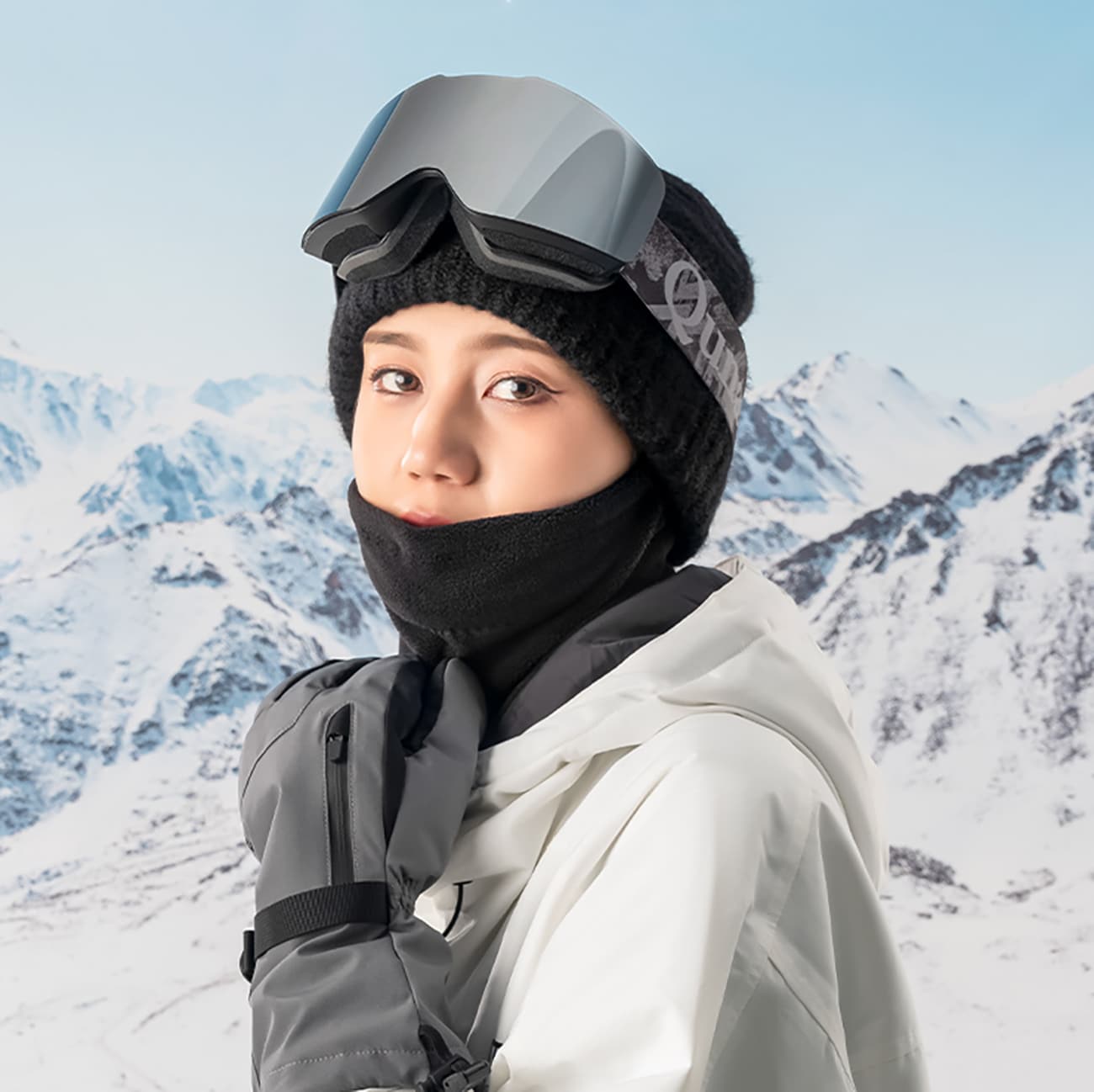 Qunature Oli Ski kaulalämmitin koko L - musta