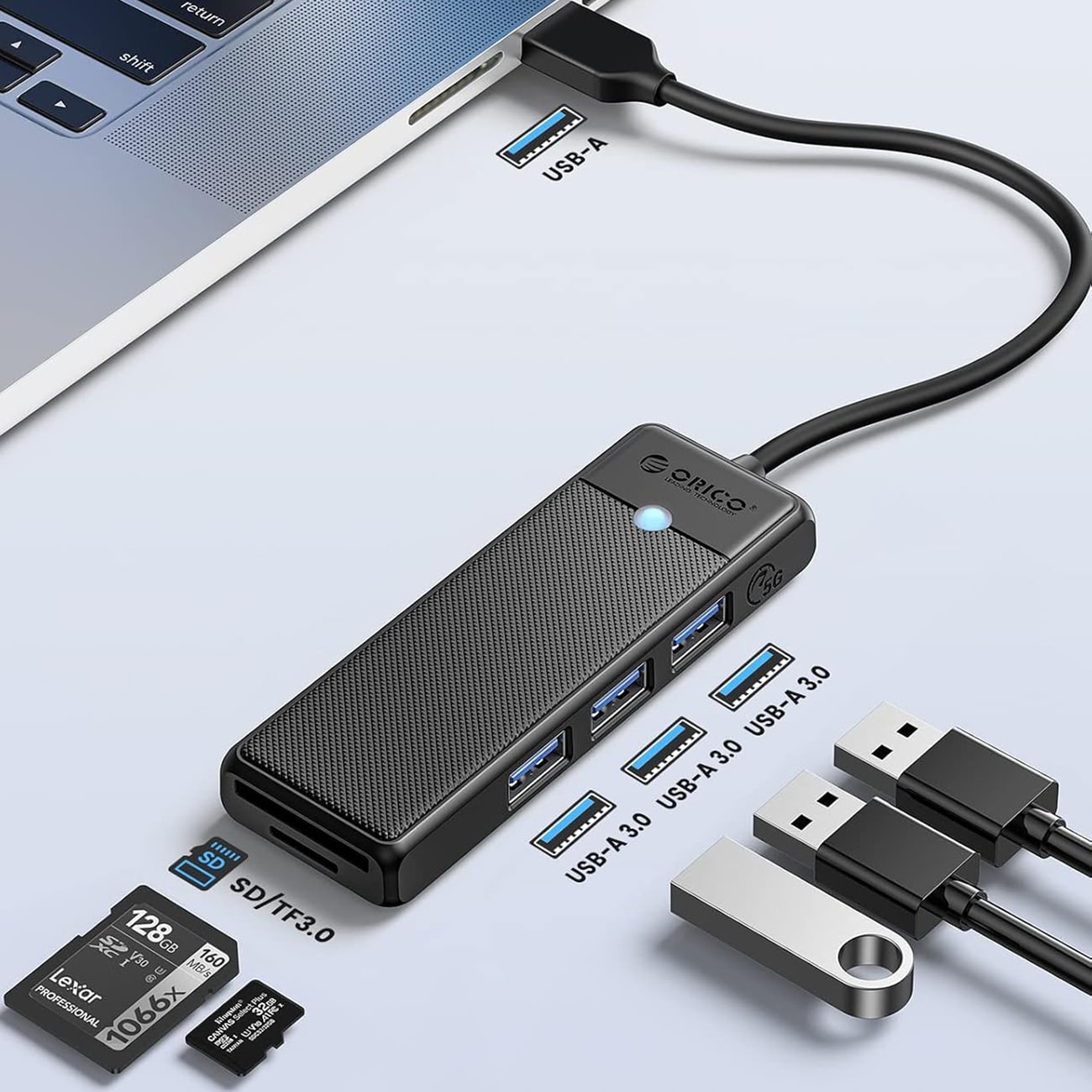 Orico PAPW3AT-U3 USB-jakaja, 4 porttia, 3 x USB-A 3.0, microSD-/SD-kortinlukija, 1 m – musta