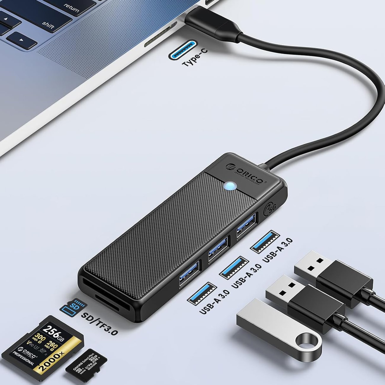 Orico PAPW3AT-C3 USB-jakaja, 4 porttia, 3 x USB-A 3.0, microSD-/SD-kortinlukija, 0,15 m – musta